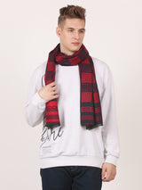 Close-up of a red and black printed men’s muffler with Greek key geometric pattern and fringed edge.