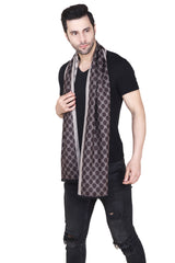 Black and grey printed men’s muffler with interlocking diamond motif, contrasting side borders and fringed edge on a white background.