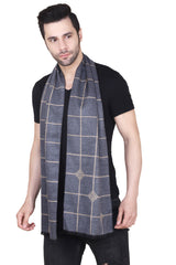 Navy blue and beige checked men’s muffler with windowpane pattern, diamond motifs and fringed edge on a white background.