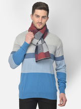 Close-up of a maroon, navy blue and grey checked men’s muffler with Cazzano label.