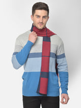 Close-up of a navy blue and red checked men’s muffler with grey detailing and Cazzano label.