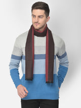Close-up of a black and red printed men’s muffler with small geometric motifs and Cazzano label.