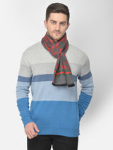 Close-up of a charcoal grey and red printed men’s muffler with abstract geometric pattern.