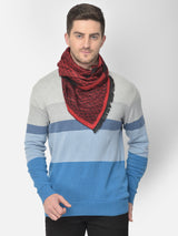 Close-up of a red and black printed men’s muffler with abstract textured pattern.