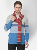 Man wearing a brick red and grey checked men’s muffler.