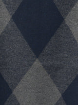 Close-up of a navy blue and grey men’s muffler with argyle diamond pattern.