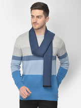 Close-up of a navy blue geometric pattern men’s muffler with Cazzano label.