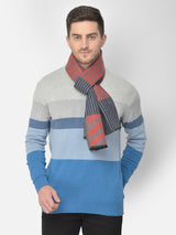 Man wearing a charcoal grey and red striped men’s muffler.