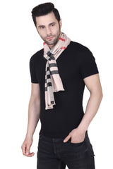 Beige, black and red checked men’s muffler with tartan plaid pattern and fringed edge on a white background.