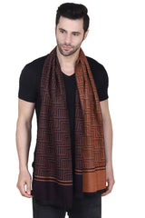 Brown and black printed men’s muffler with interlocking geometric pattern, solid border and fringed edge on a white background.