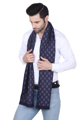 Navy blue and black checked men’s muffler with small grid pattern and fringed edge on a white background.
